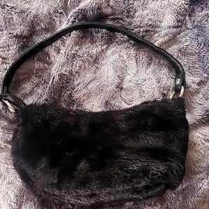 Small black fuzzy purse